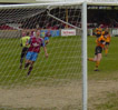 Mo Munden first to the ball as U's flounder in front of goal (Click to enlarge)